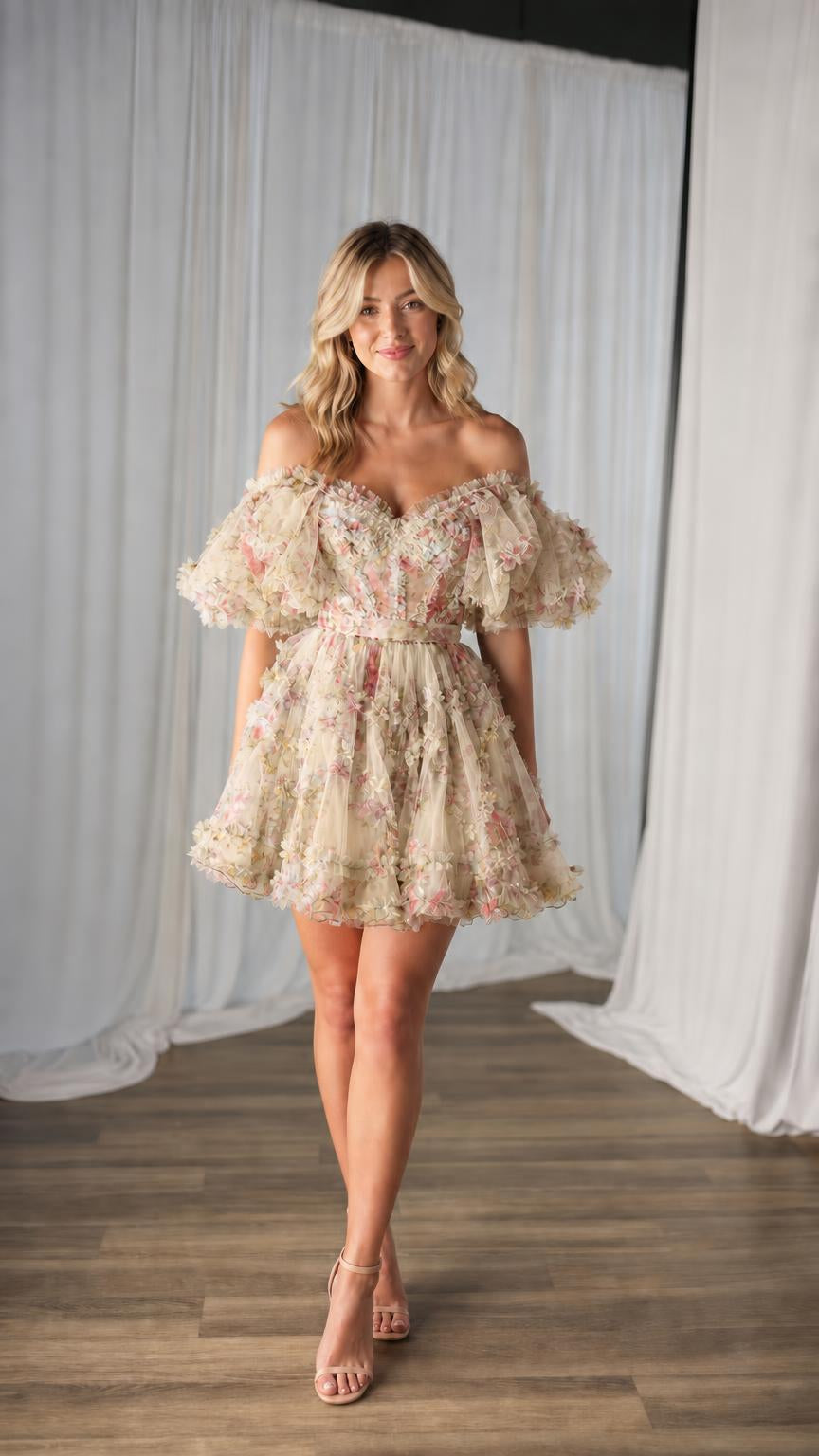 Model wearing champagne floral tulle mini dress