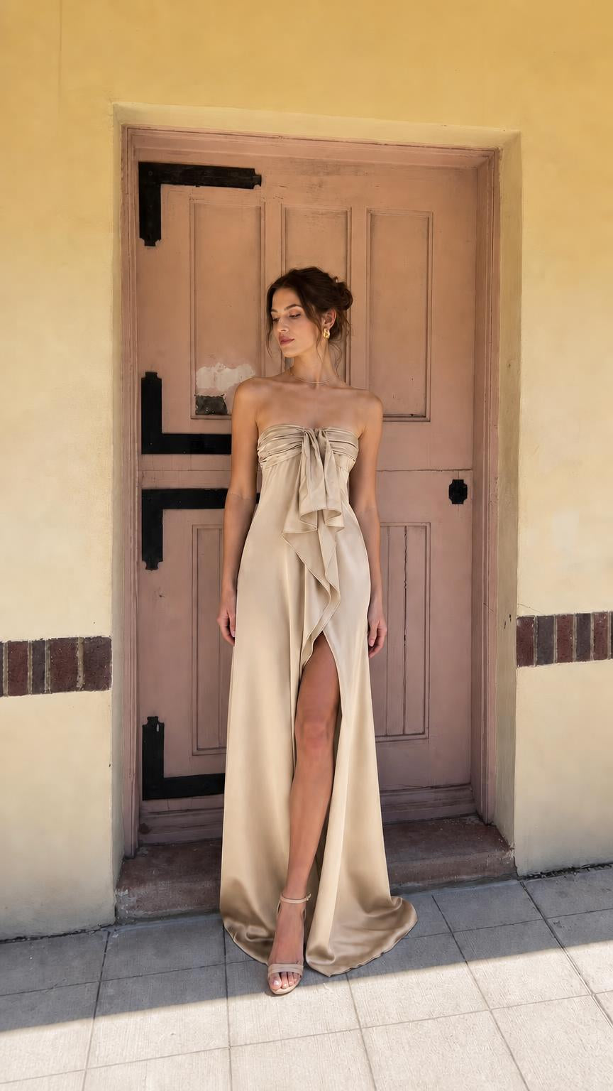 Champagne strapless evening dress with front bow and high slit