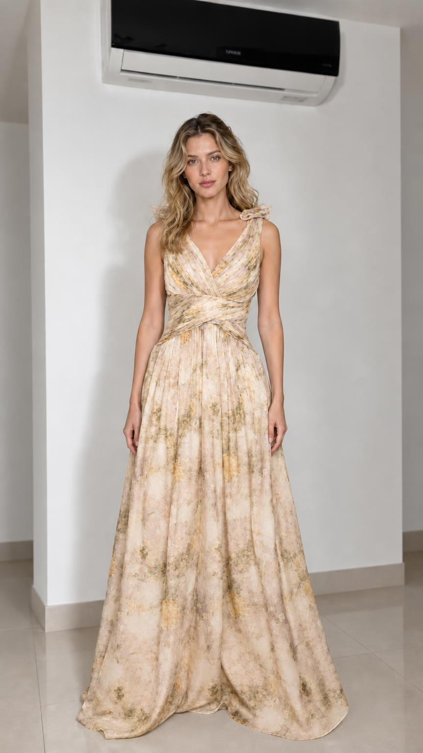 Model wearing champagne floral print maxi dress