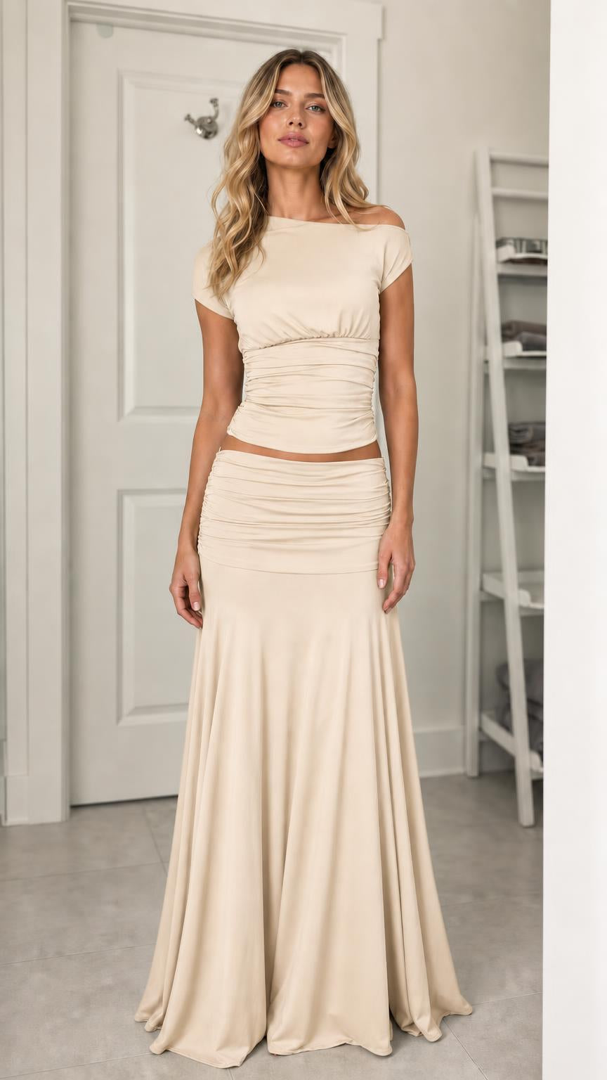 Model wearing beige ruched two-piece set